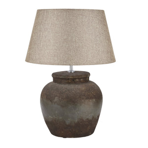 Harvey Bruce aged stone ceramic table lamp with a beige fabric shade, perfect for home decor