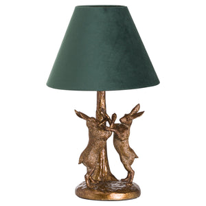 Antique gold hare lamp featuring a playful design with a green shade for elegant decor