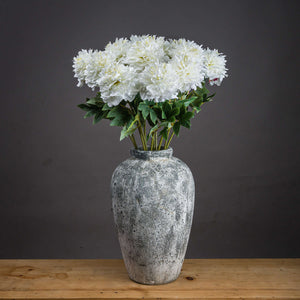 Classic white peony arrangement in a textured gray vase for elegant home decor