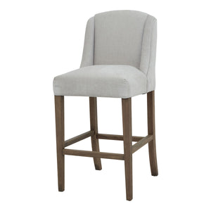 Compton grey bar stool with upholstered seat and sturdy wooden legs for modern dining spaces