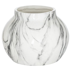 Elegant marble planter with a round shape featuring stunning black and white marbling patterns