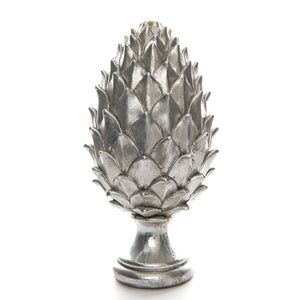 Decorative silver pinecone finial featuring intricate detailing and a smooth finish
