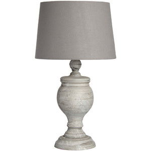 Uthina Table Lamp with a decorative base and gray fabric shade for elegant home lighting